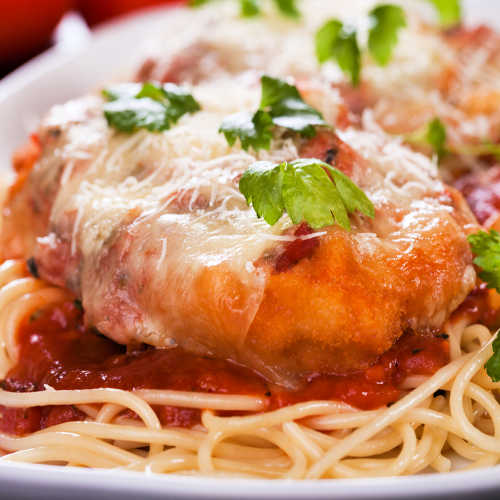 Parmesan chicken steak with cheese, spaghetti and tomato sauce